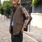 DENIM-JACKE IN SCHOKOBRAUN MIT GLITZER-APPLIKATIONEN