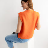 ORANGENE STRICKWESTE "SMILEY"