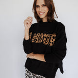 SCHWARZER PULLOVER „AMOUR"