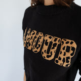 SCHWARZER PULLOVER „AMOUR"