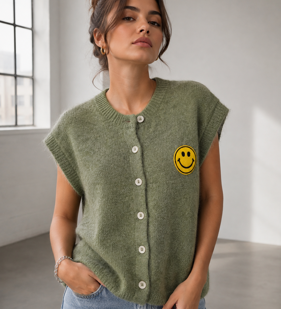 ÄRMELLOSE STRICKWESTE "SMILEY"